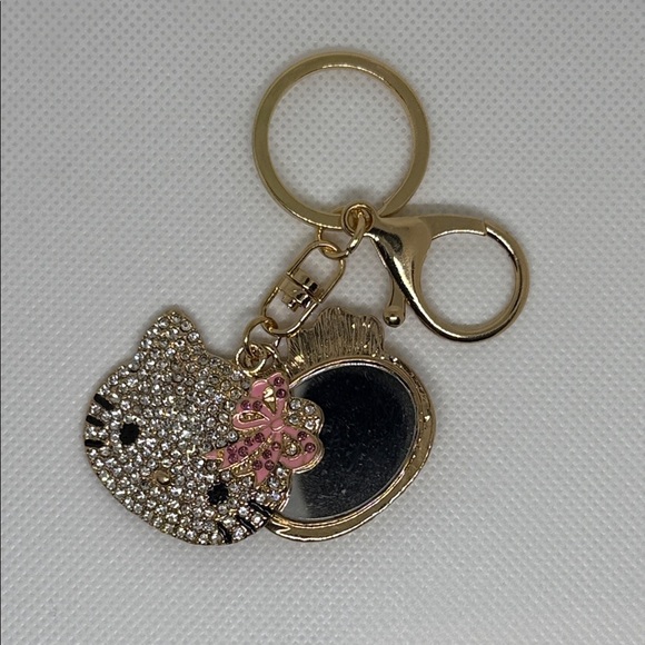 Gold and Pink Hello Kitty Keychain with a mini mirror - Picture 1 of 3
